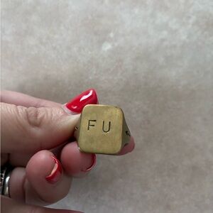 G & B’s Ring stamped with FU